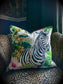 Zebra cushion white with green jungle leaves. Velvet luxury cushion animal print zebra cheetah print. Home soft furnishings.